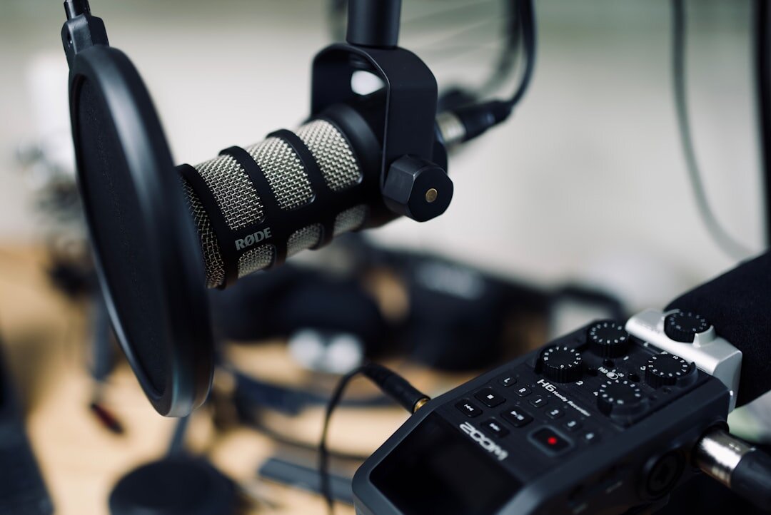 Condenser microphone on a boom arm in a recording setup